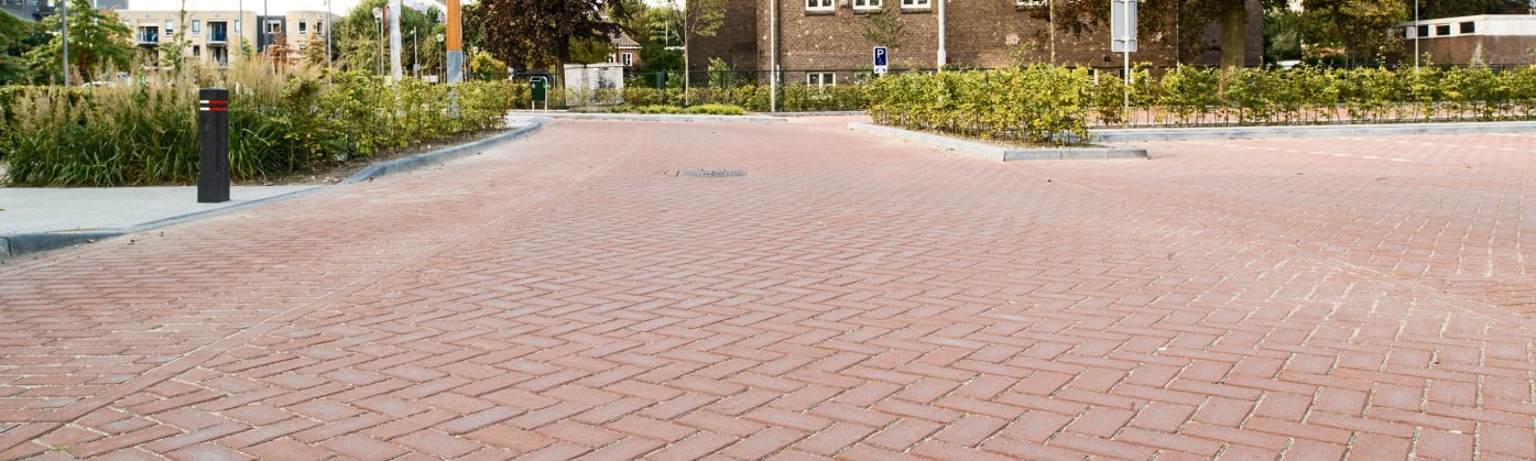 Pavers from kreitmaker make up a driveway.